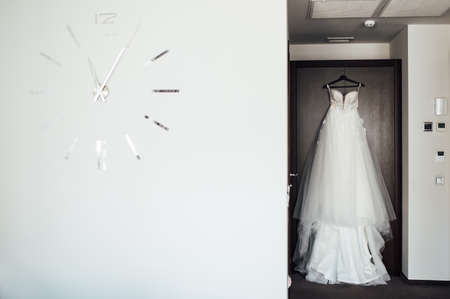 White Wedding dress on a shoulders, before ceremonyの写真素材
