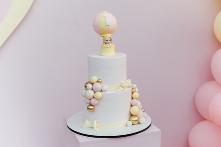 first birthday pink cake with decorations for cake smashの写真素材
