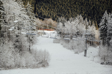 A beautiful view of the mountains from the funicular, but which skiers climbの写真素材