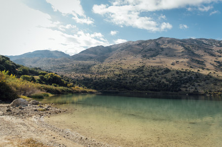 Kournas Mountain Lake in Greece. Cozy summer day and calm water in the lakeの写真素材