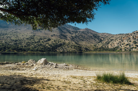 Kournas Mountain Lake in Greece. Cozy summer day and calm water in the lakeの写真素材