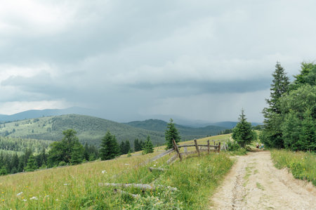 The old rocky soil road in the mountains for walking people and for driving on off -road carsの写真素材