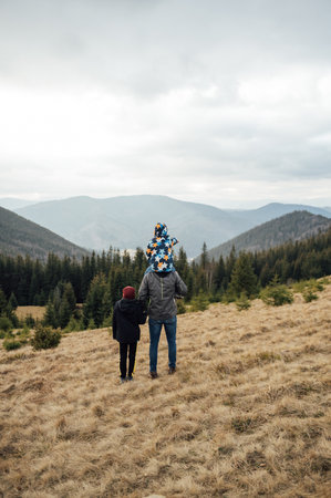 Two Brother boys stand at the top of the mountain. Ukrainian Carpathiansの写真素材