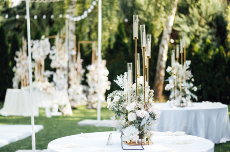 Wedding. Banquet. The chairs and round table for guests, served with cutlery.の写真素材