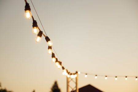 Decorative lighting lamps at a wedding party. Evening timeの写真素材