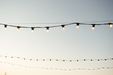 Decorative lighting lamps at a wedding party. Evening timeの写真素材