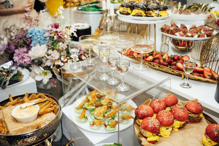 A wide variety of snacks on the table for guests. Shrimp, boiled pork, various types of meat and other productsの写真素材
