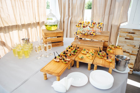 A large selection of food and various snacks at the buffet for guests before the eventの写真素材