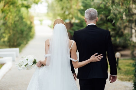 Cute bride couple spend time together after the wedding ceremonyの写真素材