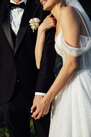 Cute bride couple spend time together after the wedding ceremonyの写真素材