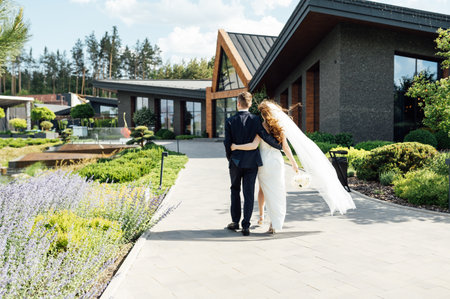 Cute bride couple spend time together after the wedding ceremonyの写真素材
