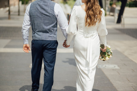 Cute bride couple spend time together after the wedding ceremonyの写真素材