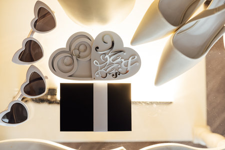 Wedding invitations. Wedding details of the bride. Bridal bouquet and other accessories. Shoes of the brideの写真素材