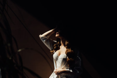 Close portrait of a sexy bride with beautiful breasts in a corset.の写真素材