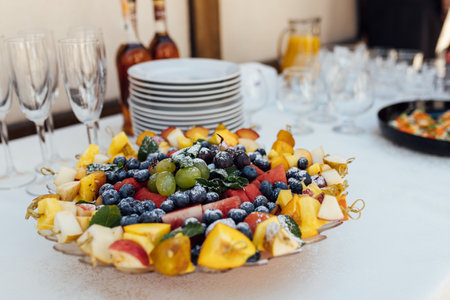 Wedding party. Buffet table with vegetables and fruits.の写真素材