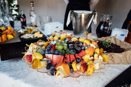 Wedding party. Buffet table with vegetables and fruits.の写真素材