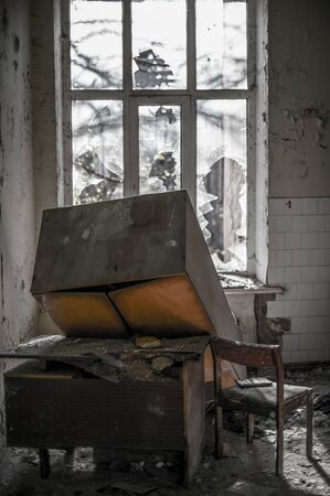 impact of destruction in war zone in Syria empty abandoned place room with demolition furniture and broken windowの写真素材