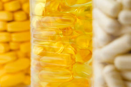 multiple tablets gel fish oil omega 3 and capsule of vitamineの写真素材