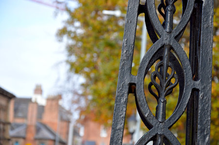 Close-up of wrought iron lamp post detail on bridgeの写真素材