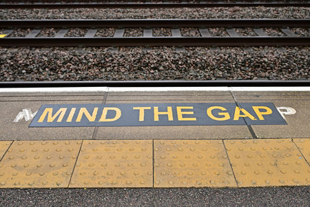 Mind the Gap Platform Warning Sign with Tactile Surfaceの写真素材