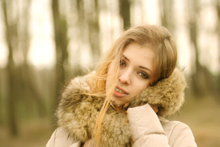 winter portrait of a beautiful blondeの写真素材