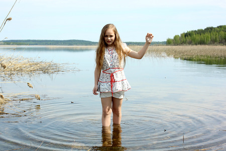 Long-haired beautiful girl enjoying the nature