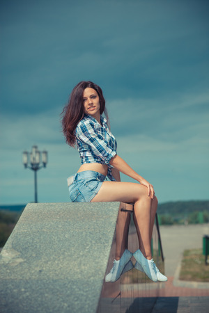 Positive hipster girl. Portrait of a pretty hipster girlの写真素材