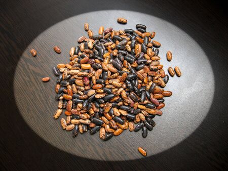 Bean seeds on brown background. These beans (Phaseolus vulgaris)  plant in northern Iran, Gilan...