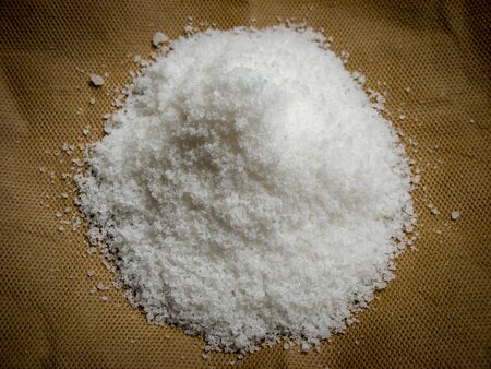 Sea salt on brown backgroundの写真素材