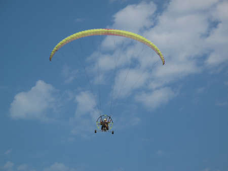 Paragliding two-person recreational flight in caspian  beach in Anzali, Iran. Caspian coast.の写真素材