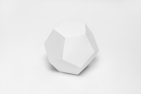 Dodecahedron of paper cardboard on white backgroundの写真素材