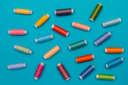 Multicolored cotton threads, spools, handmade sewing. Top view with copyspace, flat lay.の写真素材