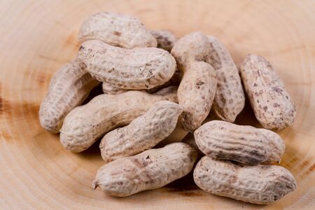 Peanuts closeup on the table. Healthly food. Nuts.
