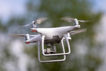 Drone quadrocopter with high resolution digital camera on the sky background.の写真素材