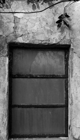 black & white still life of an old window