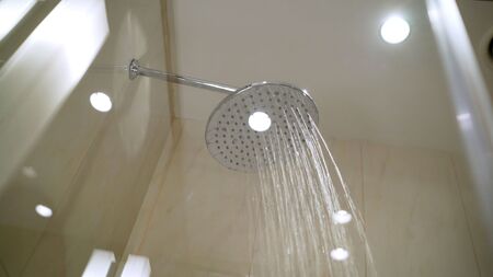 streams of water. A shower from which water pours.の写真素材
