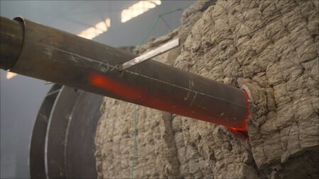 Capter at the factory. Industrial production - smoking. Supply of hot air through a pipe. Hot...