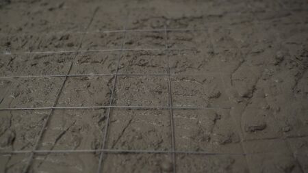 Indication of mortar on the floor and leveling of concrete floors. Leveling concrete with trowels,...