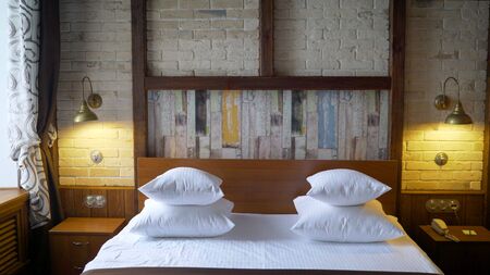 Interior design detail of a luxury hotel room. bed in a hotel roomの写真素材