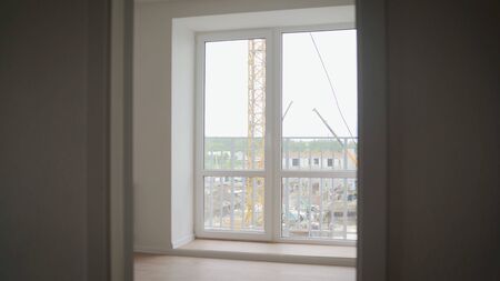 New building, new apartment. New apartment from the inside. Modern interior- sunlit empty roomの写真素材