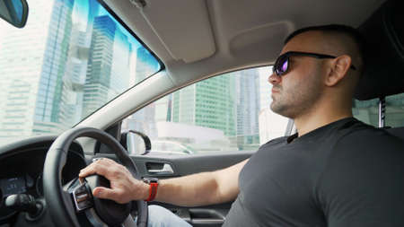 Priming Concrete floor before laying tiles on it, the final preparatory stage for strengthening the surface. Floor priming process.の写真素材