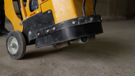 A grinding machine used to prepare the surface of a concrete floor before laying a new layer. The...