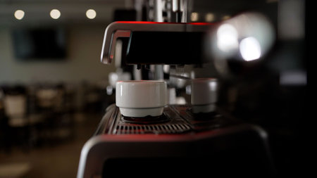 Coffee machines make coffee without people. Americano preparation process. Espresso from a coffee machine.の写真素材
