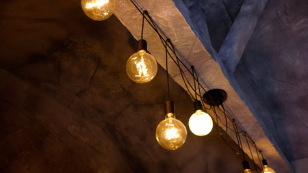Chandelier - light bulbs, design solution. Retro incandescent lamps in realistic design. Glowing...