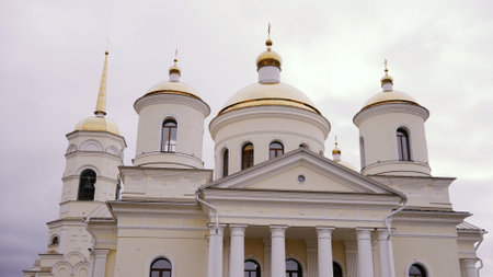 Golden domes shining on a Russian orthodox church building, showcasing traditional architecture and...