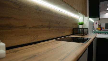 Kitchen furniture for sale in showroom. Kitchen showroom interior with various cabinets, kitchen counters.の写真素材