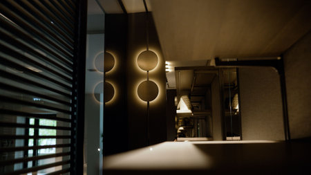 Sliding doors are closing, revealing a modern walk-in closet with circular lights and mirrored walls