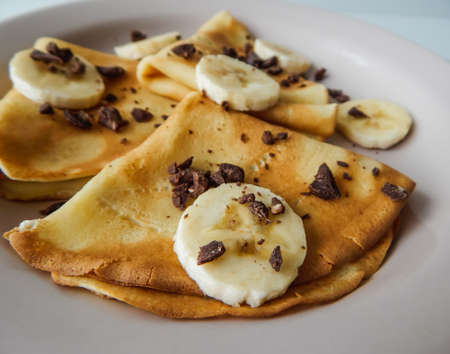 pancakes with slices of banana and chocolate, carnivalの写真素材