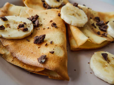 pancakes with slices of banana and chocolate, carnivalの写真素材