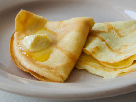 pancakes with butter on a plate, Maslenitsaの写真素材